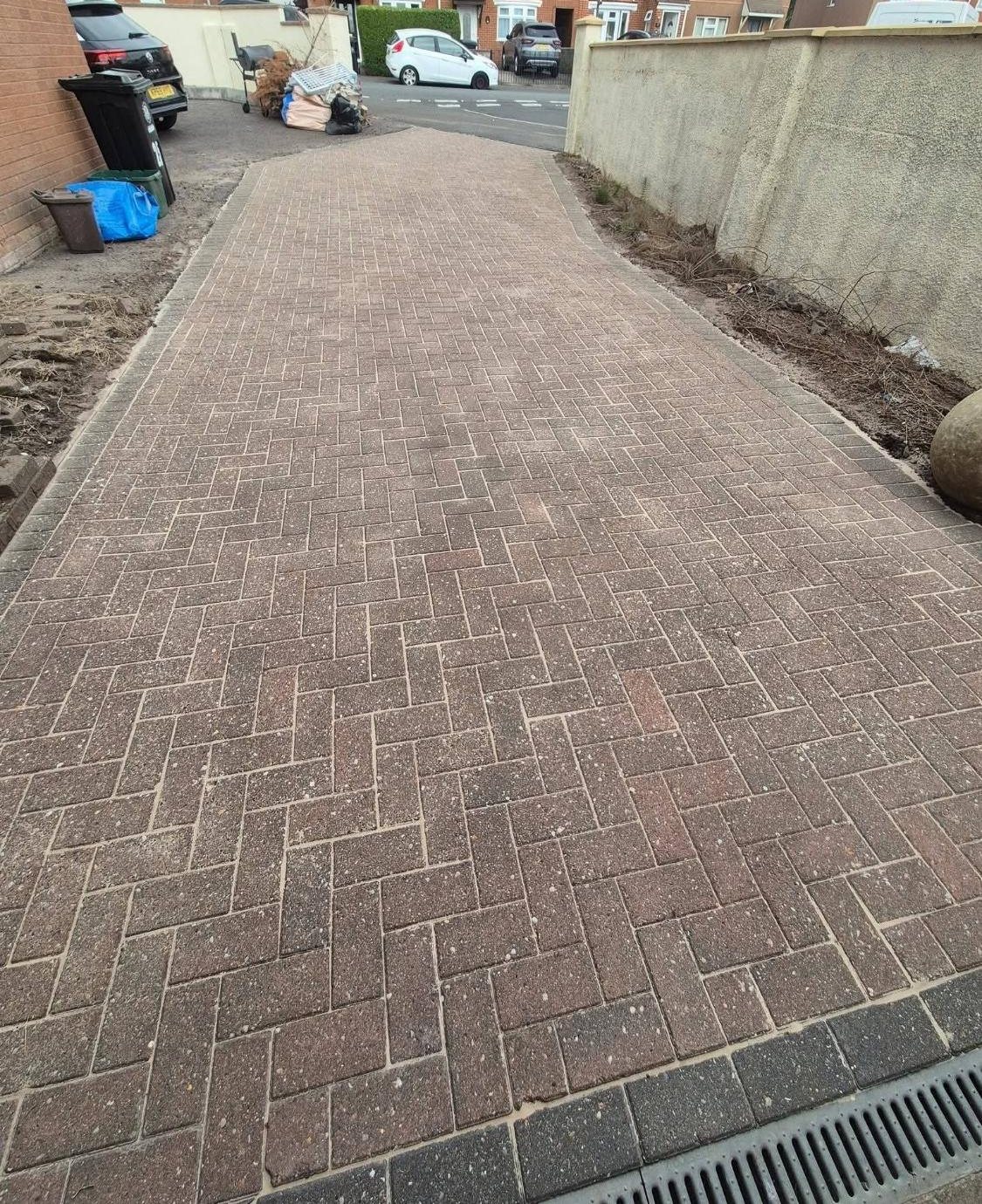 The same driveway after pressure washing