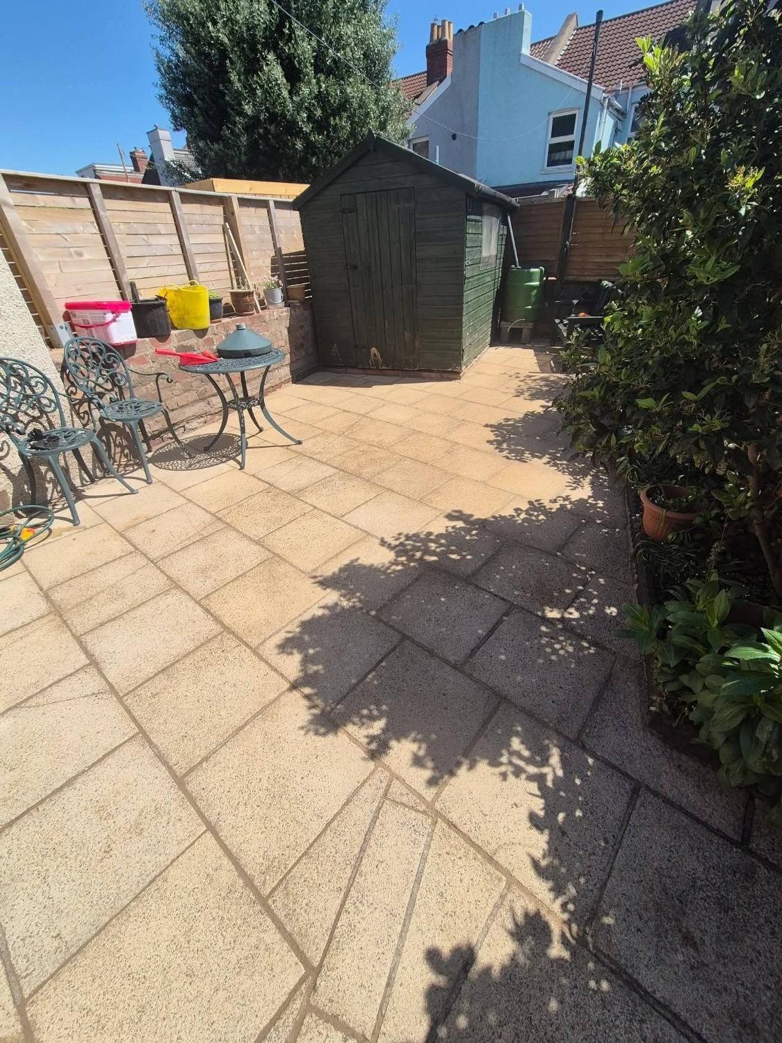 The same patio after pressure washing